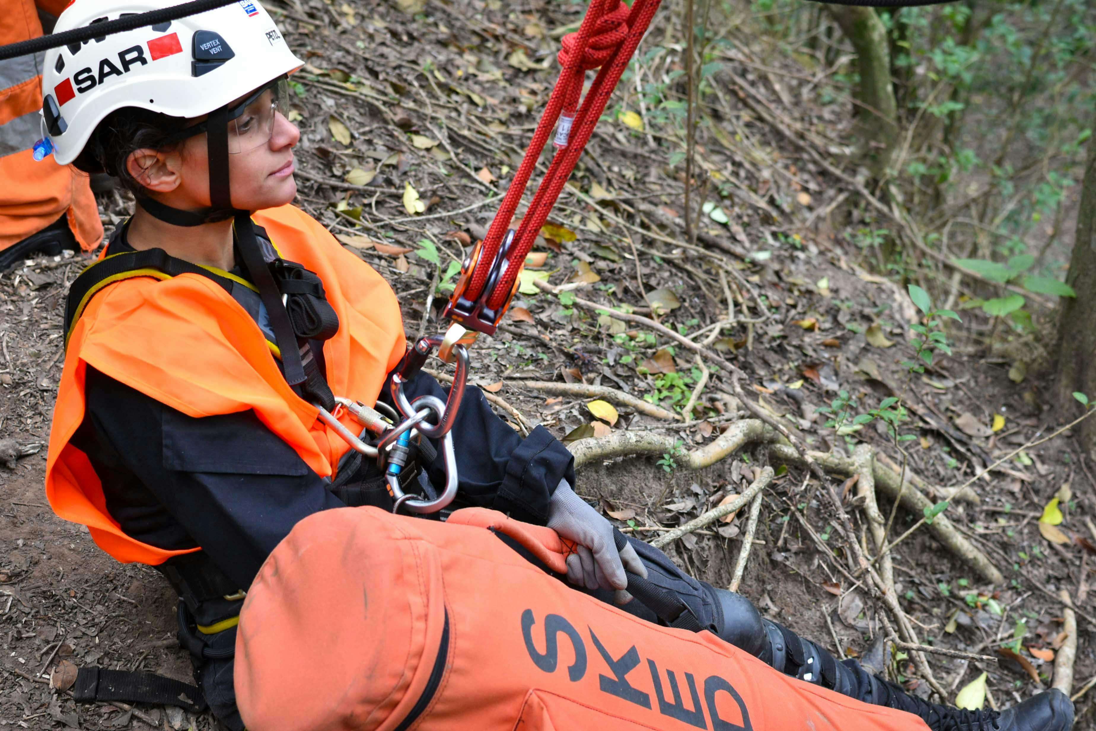 Rope access trainee in full PPE practising rope rescue techniques