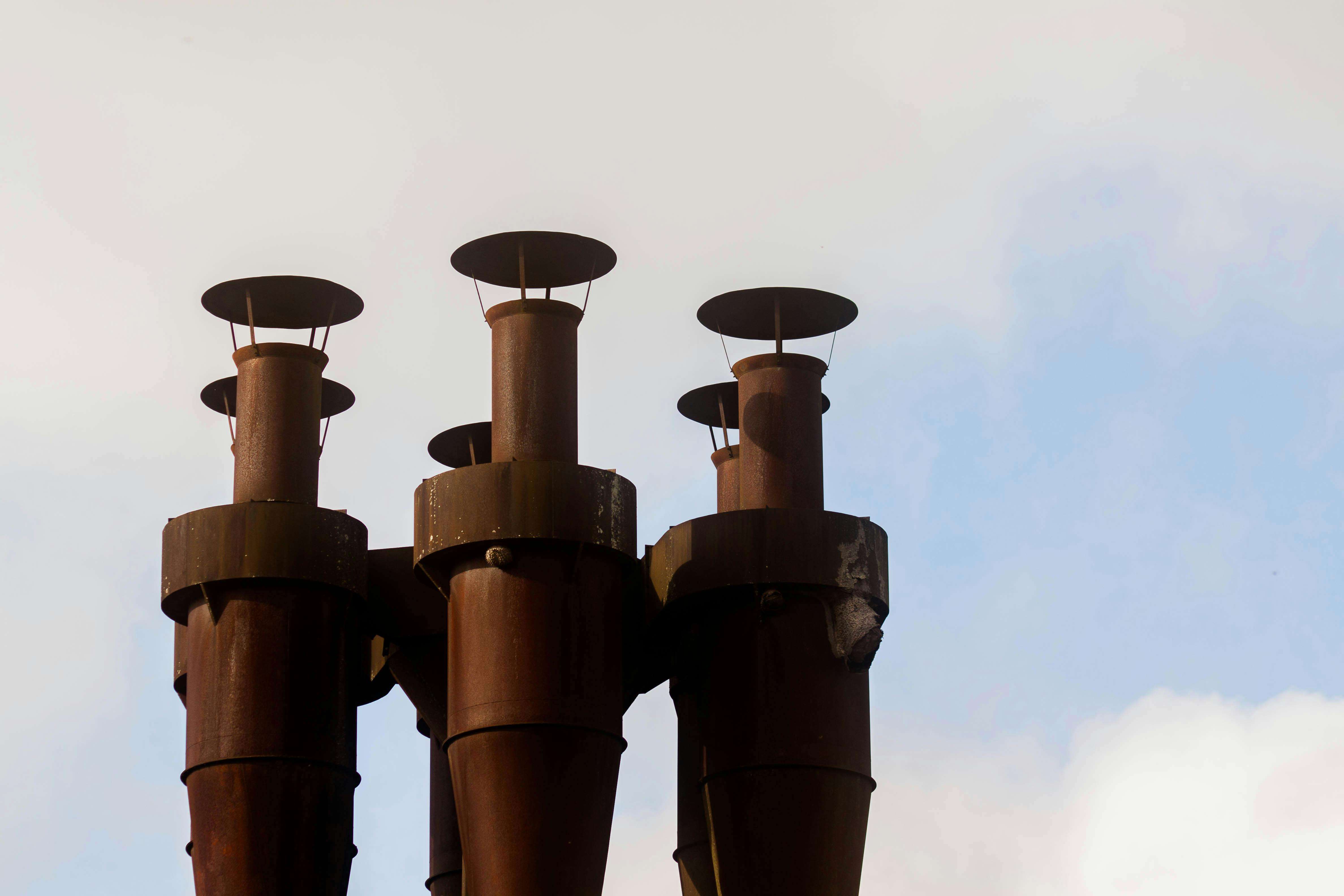 Scunthorpe steelworks chimneys against a cloudy sky